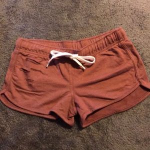 Slightly purple short shorts.